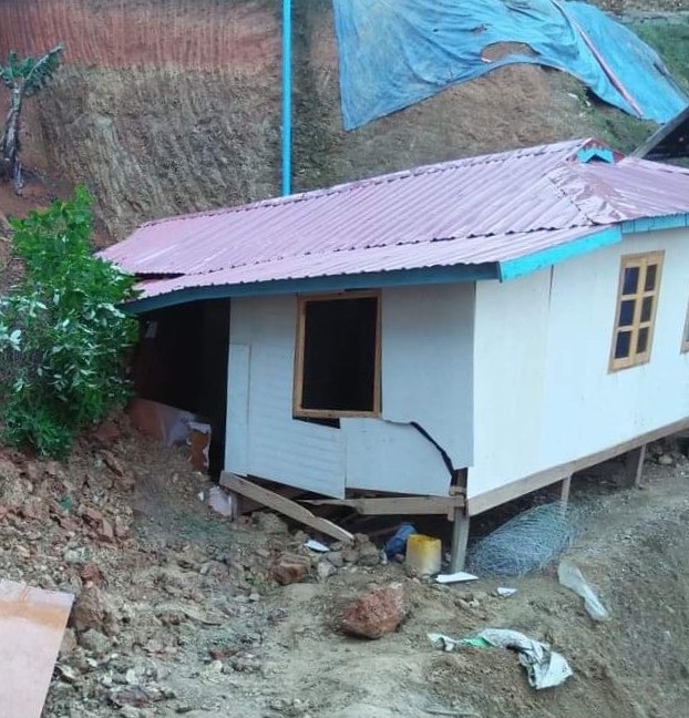 Naing Ha's house after it fell during the landslide